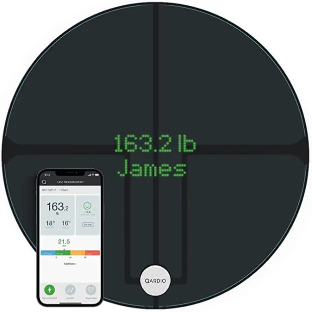 A qardiobase 2 wifi smart scale in a round shape with black color